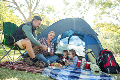 family at tent campsite together