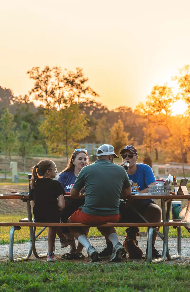 family at picnic table