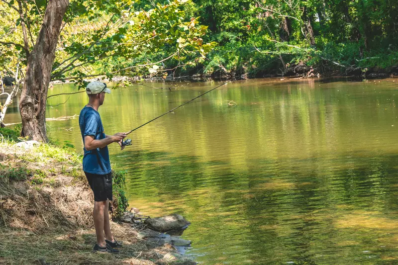 man fishing in the river