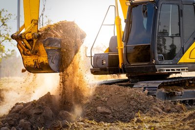 excavator digging dirt