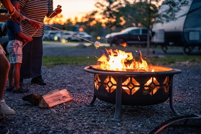family making smores at River Cove Campground in the Smoky Mountains